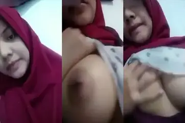 Ukhti Jilbab Merah Pamer Toket Gede Ngentot Ganas